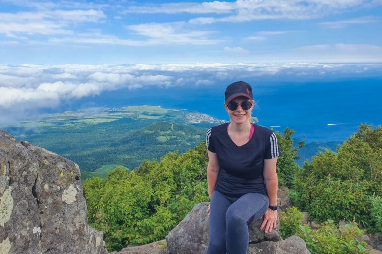 Ruth Aisling at the summit of Mt. Rishiri in Hokkaido, Japan